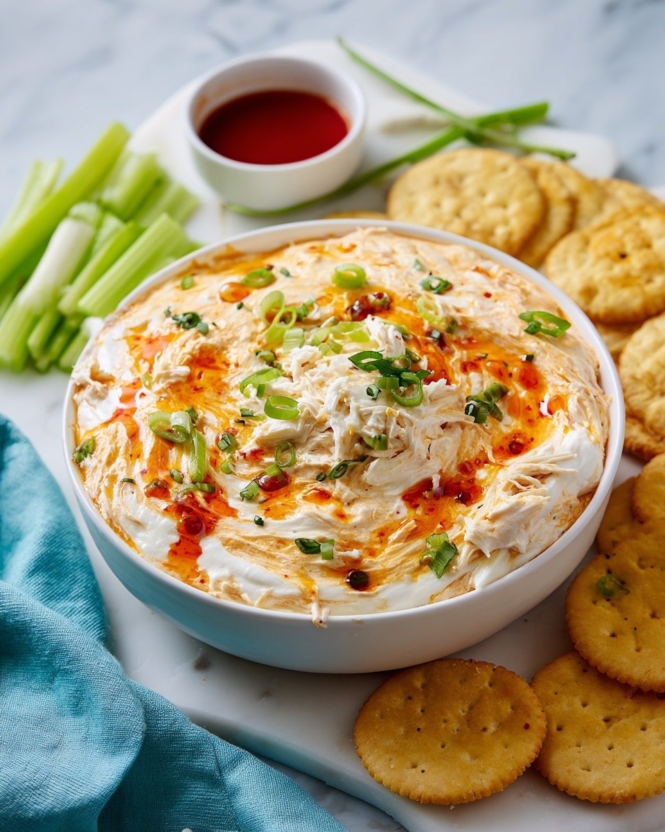 Buffalo Chicken Dip Recipe - Recipe Image — Buffalo Chicken Dip, spicy chicken dip, easy appetizer recipes, game day dips, creamy buffalo chicken