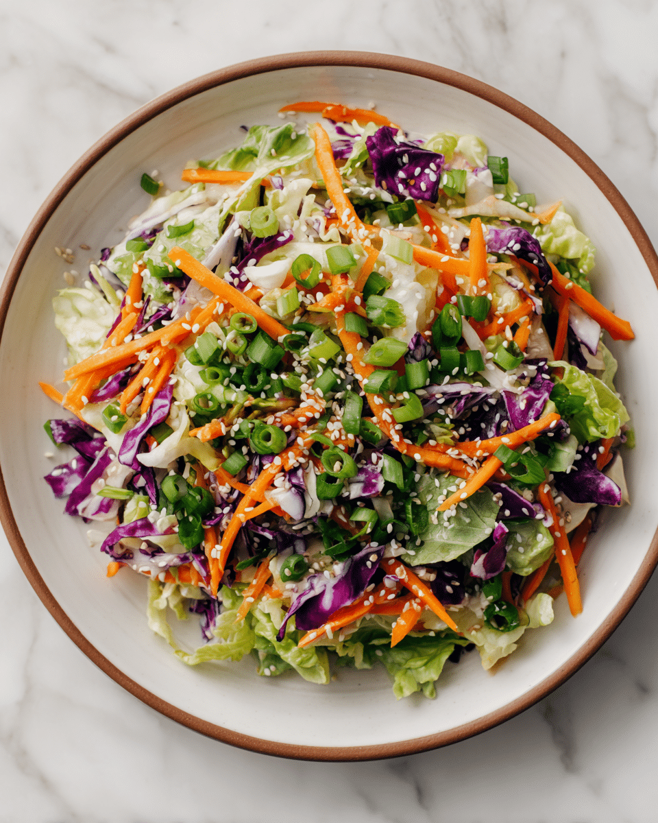 Crunchy Asian Cabbage Slaw with Addictive Sesame Dressing Recipe - Recipe Image — Crunchy Asian Cabbage Slaw with Addictive Sesame Dressing, Asian Cabbage Slaw, Sesame Dressing, Summer Vegetable Salad, Healthy Asian Side Dish