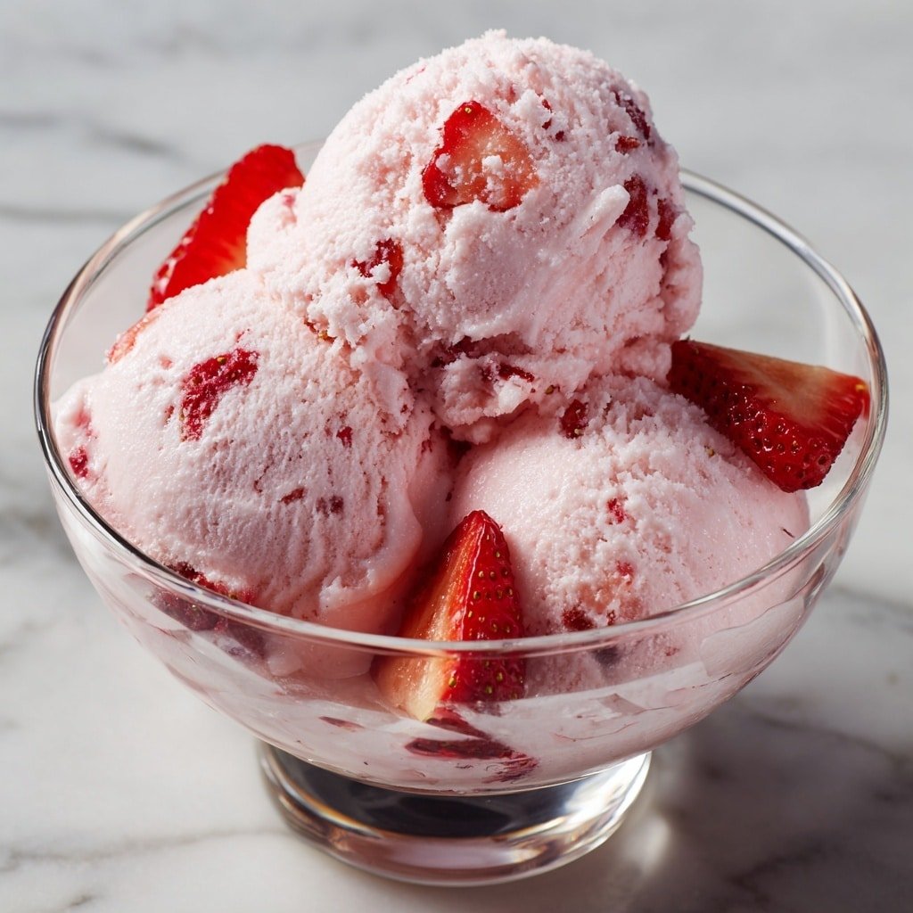 Strawberry Greek Frozen Yogurt Recipe - Recipe Image — Strawberry Greek Frozen Yogurt, healthy frozen dessert, homemade frozen yogurt, easy summer treats, refreshing Greek yogurt dessert